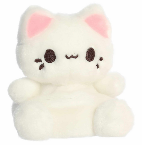 Soft plush cat with creamy white body, pink ears, and a cheerful embroidered face sitting upright.