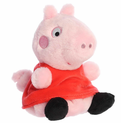 Soft plush Peppa Pig wearing red dress with cheerful expression, sized to fit comfortably in the palm of your hand