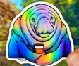Holographic sticker featuring a colorful manatee holding a coffee cup with a friendly expression and smooth lines