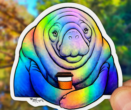 Holographic sticker featuring a colorful manatee holding a coffee cup with a friendly expression and smooth lines