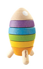 Colorful wooden stacking rocket toy with five rings and three legs for fine motor skill development and play