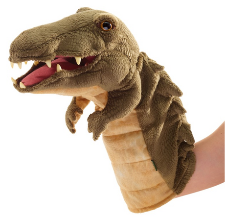 Hand puppet shaped like a friendly crocodile with a movable mouth, worn on a hand for storytelling fun.