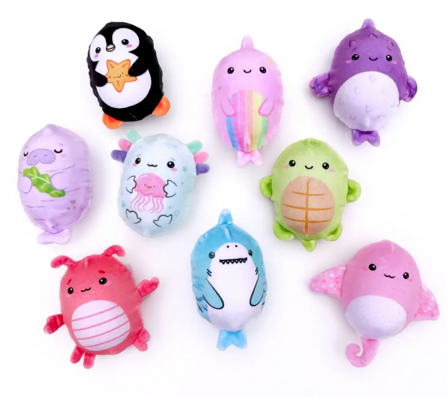 Collection of colorful plush sea creature squishy toys with bubble-filled sensory balls inside for stress relief and fun.