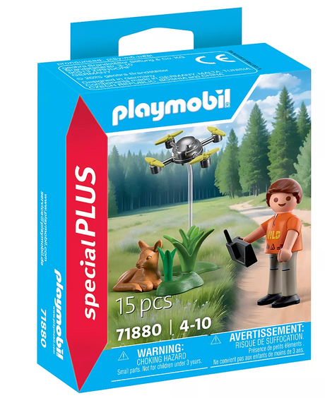 Playmobil Special Plus set with explorer figure, drone, and fawn in a forest rescue scene for kids ages 4 to 10.