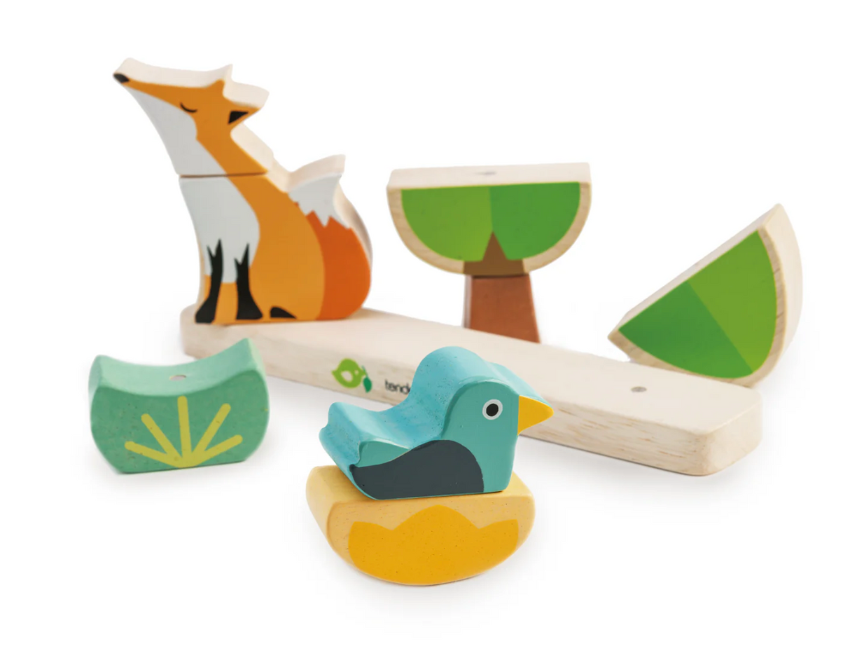 Wooden magnetic stacking toy with a fox, duck, and three-piece tree designed for toddler shape recognition and matching skills.