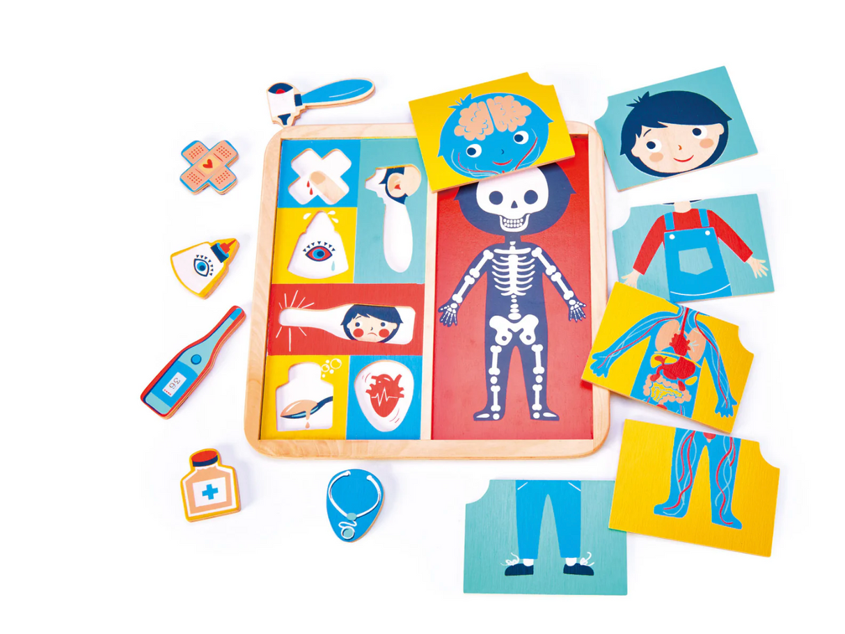Colorful educational puzzle with human body parts and medical tools designed for children age three and up to learn anatomy.
