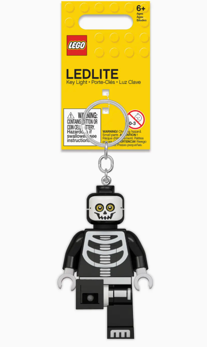 LEGO Skeleton keychain with LED light, movable arms and legs, metal ring, and battery included, 3 inches tall.