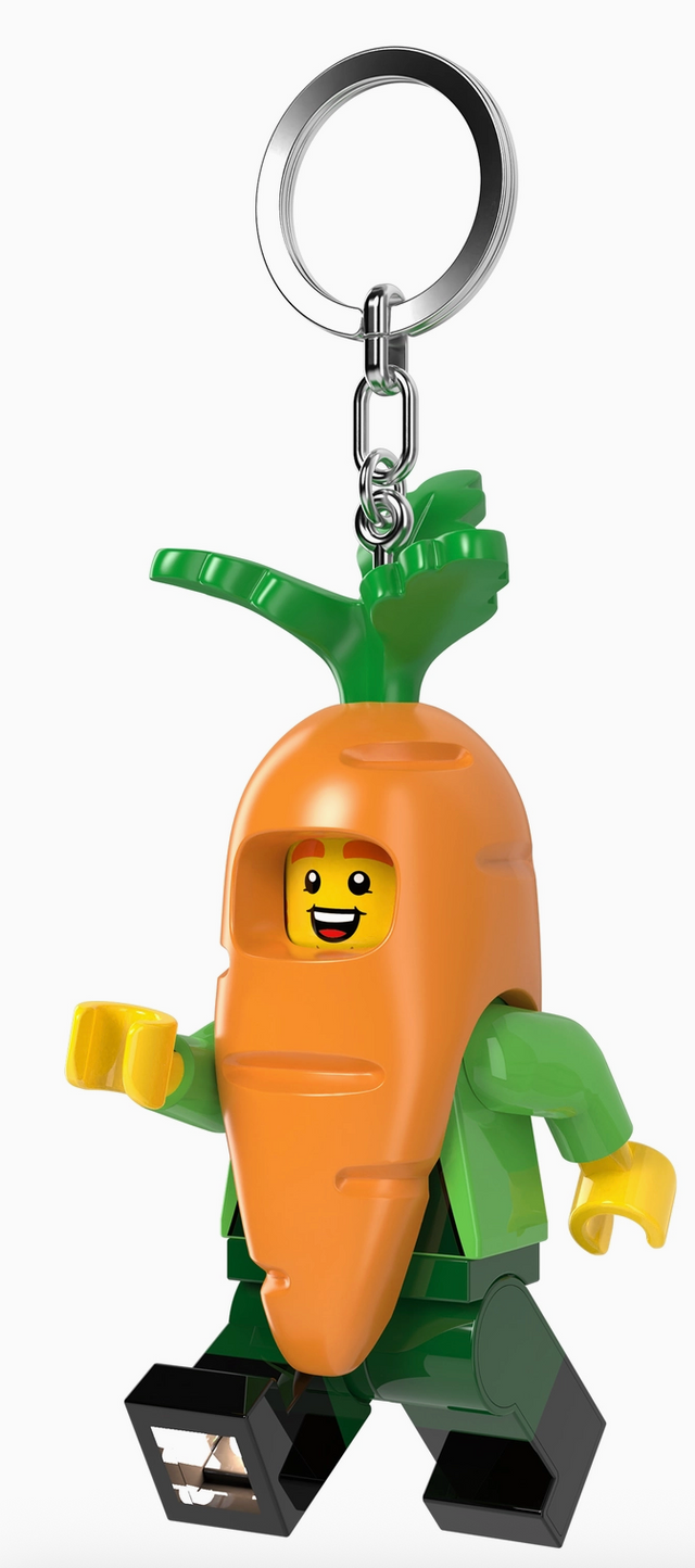 LEGO style carrot mascot keychain with smiling face and LED light, three inches tall, colorful and playful design
