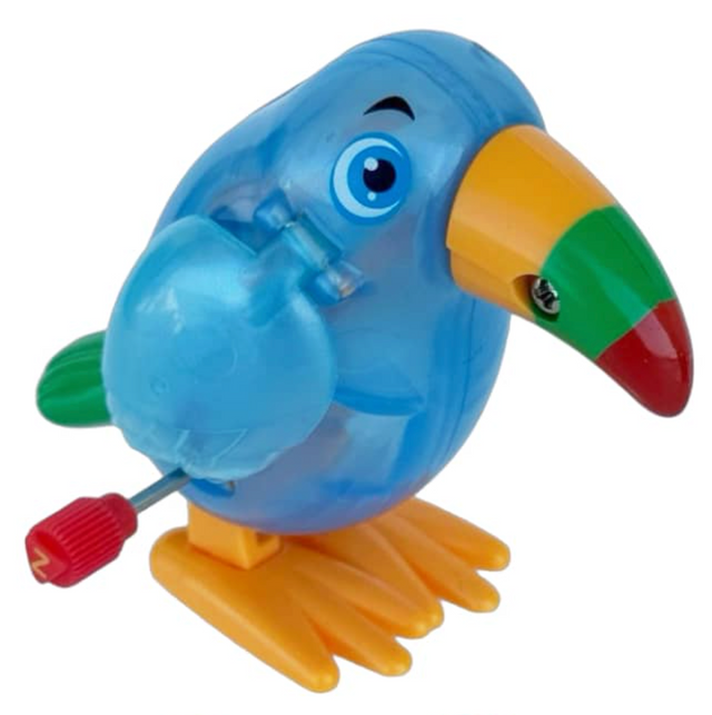 Colorful translucent blue wind-up toucan toy with shiny wings and multicolor beak standing on orange feet
