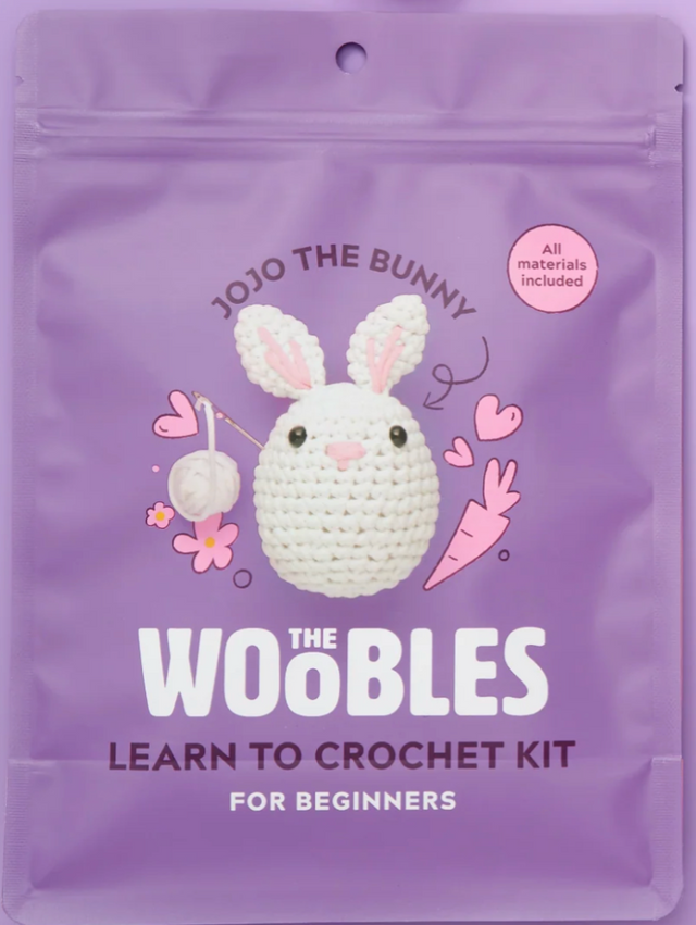 Purple pouch packaging of a beginner crochet kit featuring Jojo the Bunny with all materials included for easy crafting.