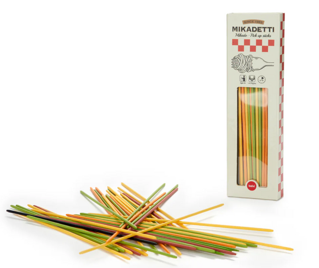 Colorful spaghetti-like pickup sticks game next to packaging designed to resemble an Italian pasta box