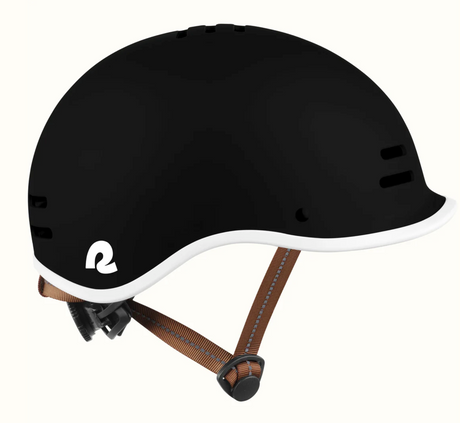 Remi Kids Bike & Skate Helmet in black with white trim, adjustable straps, built-in visor, and breathable design for safety.