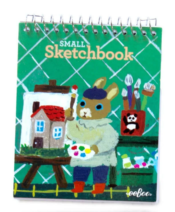 Small Sketchbook | Yumi Kitagishi featuring playful bunny artist on green spiral-bound cover with paint brushes.