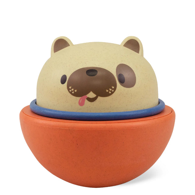 Rocking Rollers Dog toy made of bioplastic, rocks back and forth or glides on wheels for toddler play.