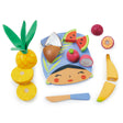 Tropical Fruit Chopping Board with wooden fruits including pineapple, watermelon, coconut, banana, passionfruit, dragon fruit, and blue knife.