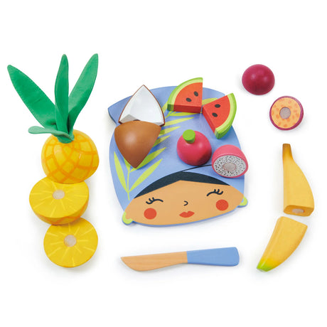 Tropical Fruit Chopping Board with wooden fruits including pineapple, watermelon, coconut, banana, passionfruit, dragon fruit, and blue knife.
