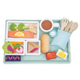 Airline Meal Tray with 3 courses, bread roll, cutlery, tea cup, and dessert on a light blue tray for kids.