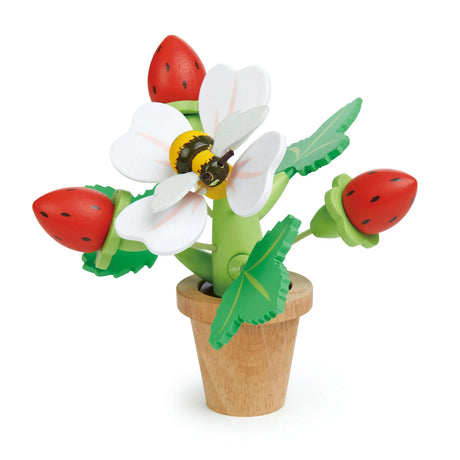 Strawberry Flower Pot wooden toy with removable leaves, strawberries, and a magnetic bumblebee for imaginative play.