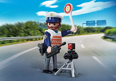 Playmo-Friends | Traffic Policeman toy figure with radar, police ladle, and accessories on a road background.