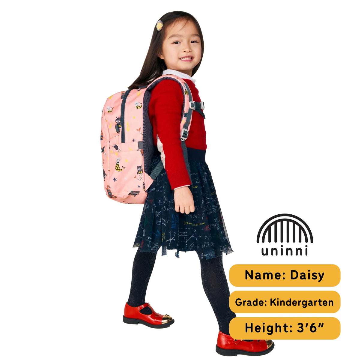 Young girl wearing Ethan Backpack | Swimming Mercats pink kids school backpack with adjustable straps and multiple compartments.