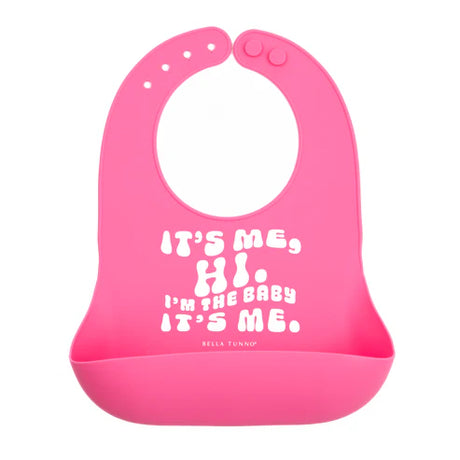 Pink Wonder Bib | It's Me Hi silicone baby bib with adjustable neck and catch pocket to keep messes contained.