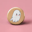 Button | Ghost featuring a cute smiling ghost on a 1.25-inch round beige background button.