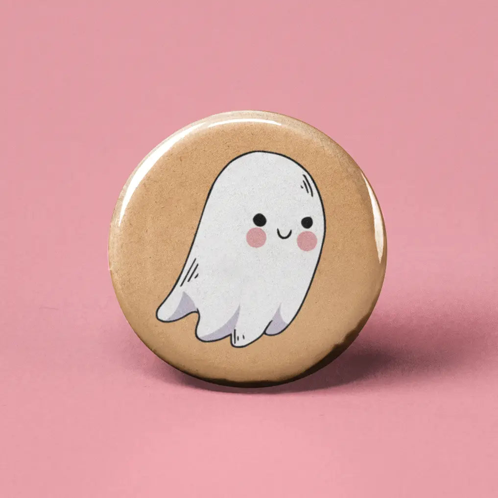 Button | Ghost featuring a cute smiling ghost on a 1.25-inch round beige background button.