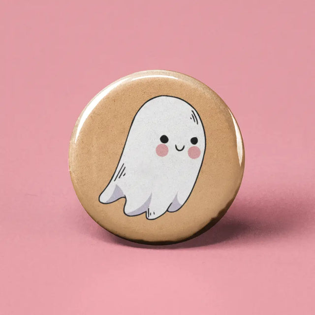 Button | Ghost featuring a cute smiling ghost on a 1.25-inch round beige background button.