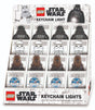 Lego Keylight | Star Wars display box featuring Darth Vader, Stormtrooper, Chewbacca, and R2-D2 keychain lights.