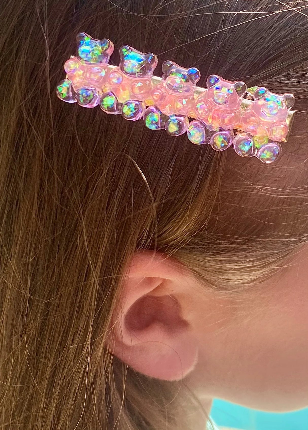 Hair Candy Gummy Bear Clip with sparkly translucent gummy bears decorating hair, perfect for ages 3 and up.