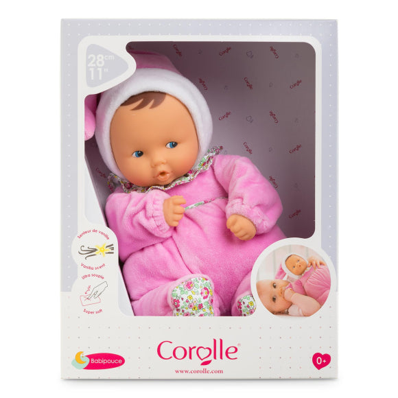 Babipouce Blossom Garden doll in pink outfit with realistic vinyl face, soft body, and vanilla scent, 11 inches tall.