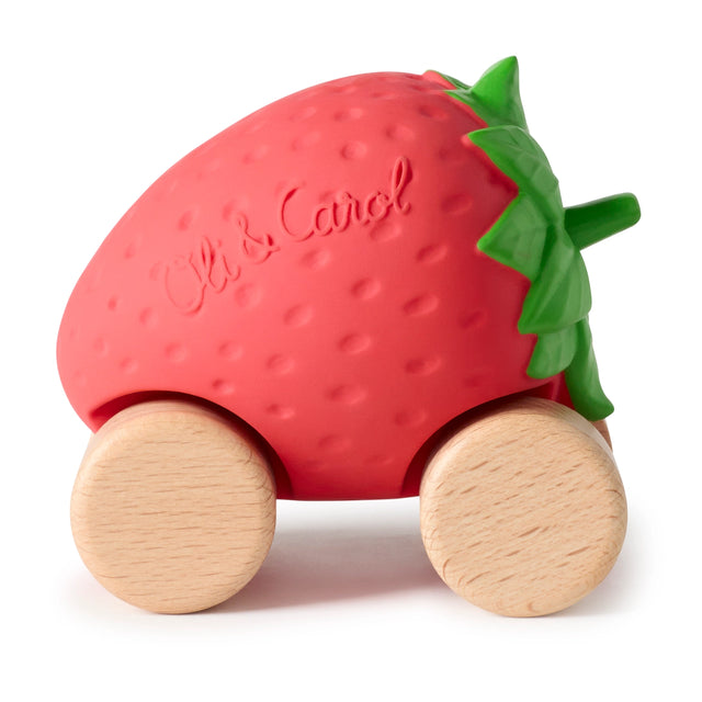Eco-friendly baby car toy shaped like a strawberry with wooden wheels and natural rubber body for sensory play.
