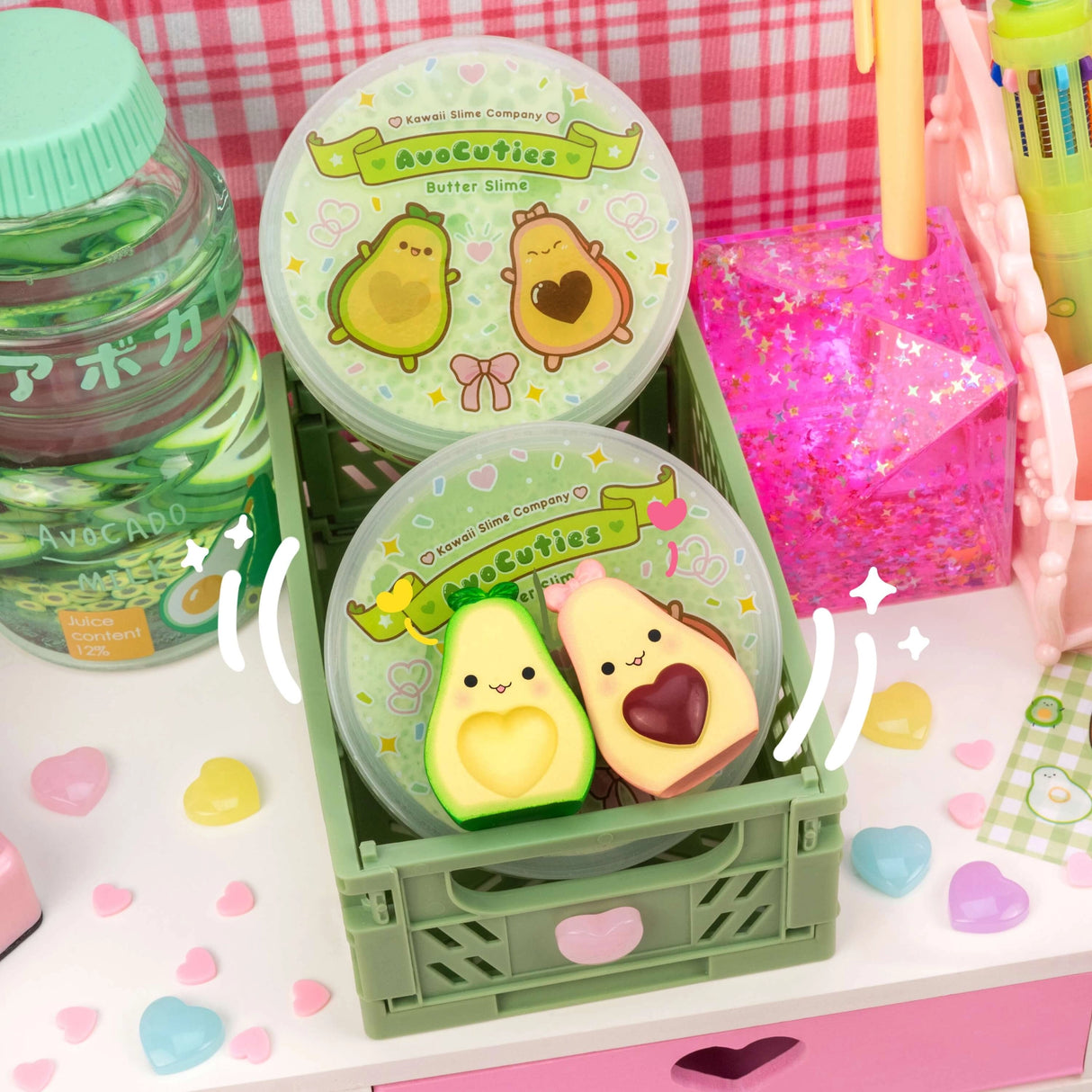 AvoCuties Butter Slime with cute avocado couple charm and creamy fluffy texture in pastel packaging.