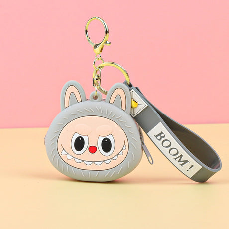 Labubu Head Coin Purse with cheerful face and keychain strap labeled BOOM for carrying coins securely.