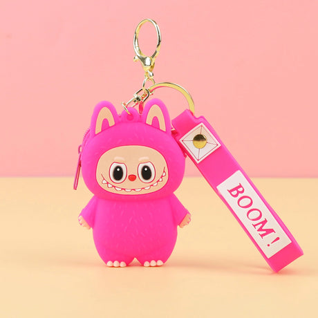 Labubu Cute Coin Purse in bright pink silicone with a smiley face and keychain accessory against a pink background.