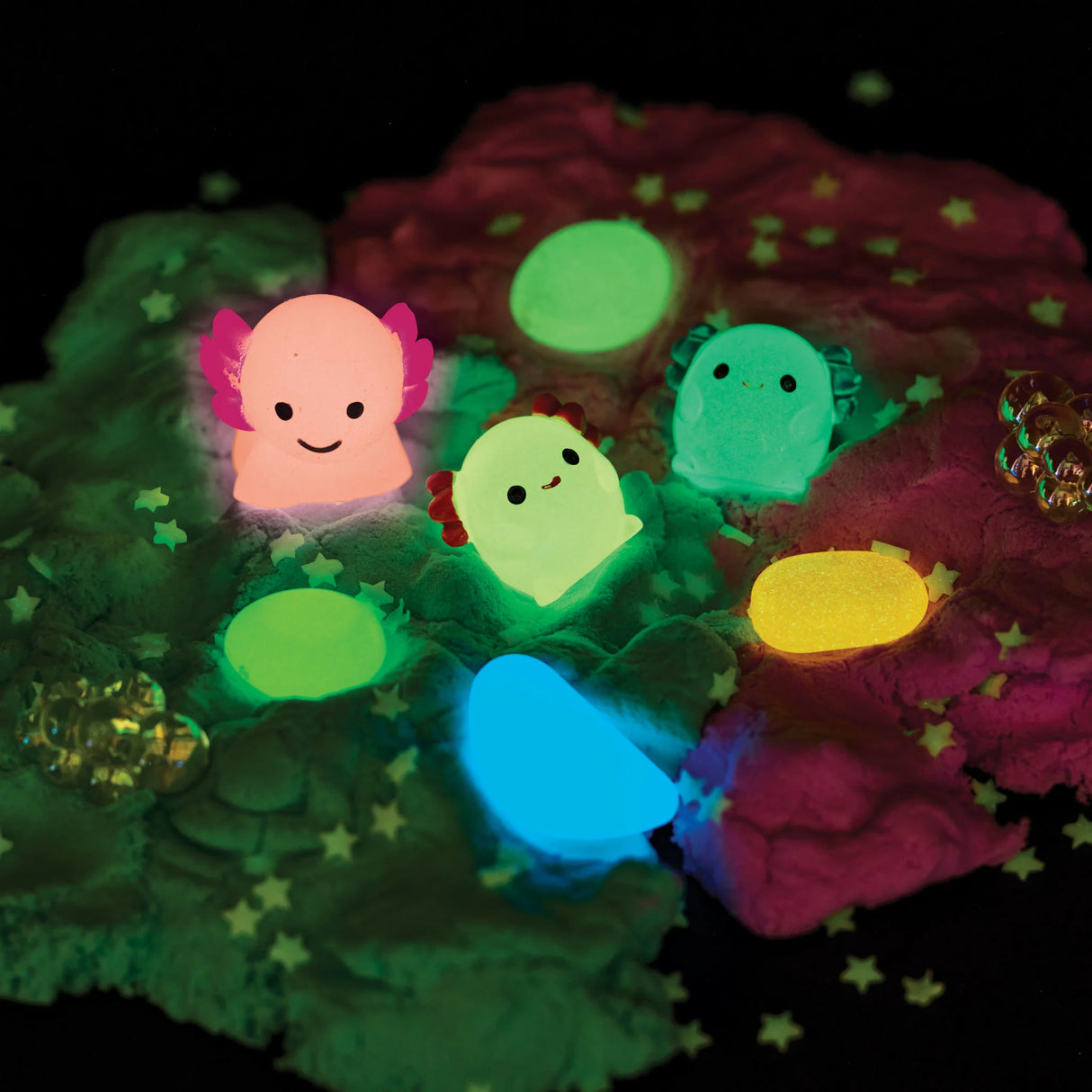 Sensory Pack | Axolotl with glowing axolotl toys and colorful cloud clay for toddler sensory play.