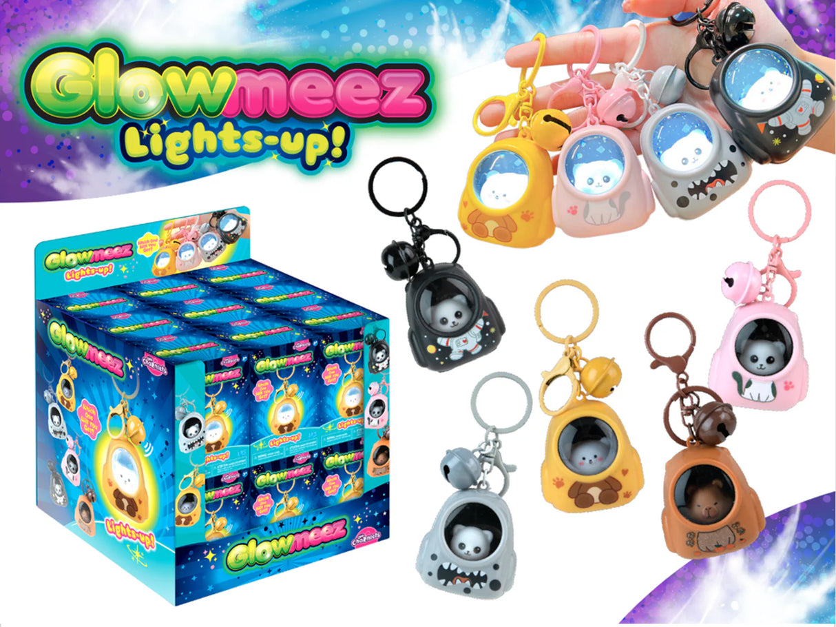 Glowmeez Charmlet Blind Box keychains in assorted glowing animal designs displayed with retail box packaging
