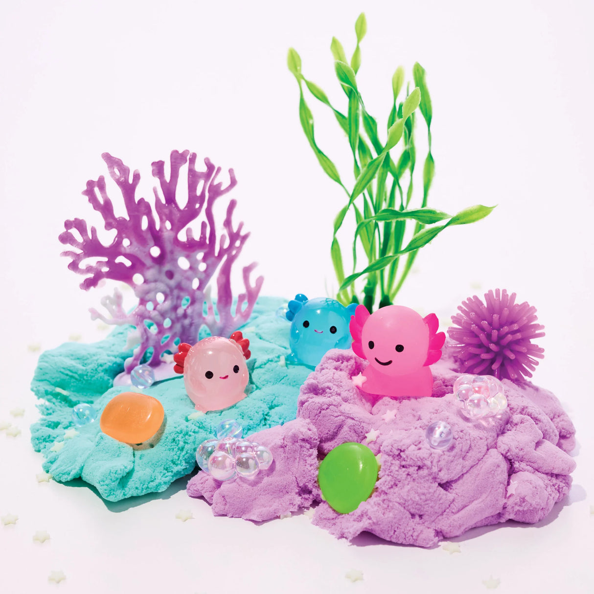 Sensory Pack | Axolotl with colorful cloud clay, glow axolotl toys, faux coral, and sensory play accessories for toddlers.