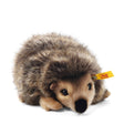 Hedgehog Joggi plush with soft tipped fur, realistic colors, and Steiff's signature yellow "Button in Ear" tag.