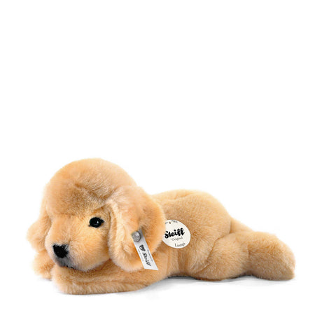 Golden Retriever Lumpi plush toy lying down with soft golden fur and soulful safety eyes.