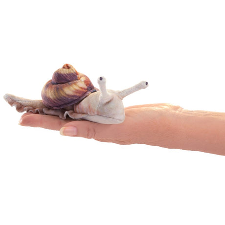 Snail Finger Puppet resting on a hand, showing detailed lifelike design with weighted beads for nature play and storytelling.