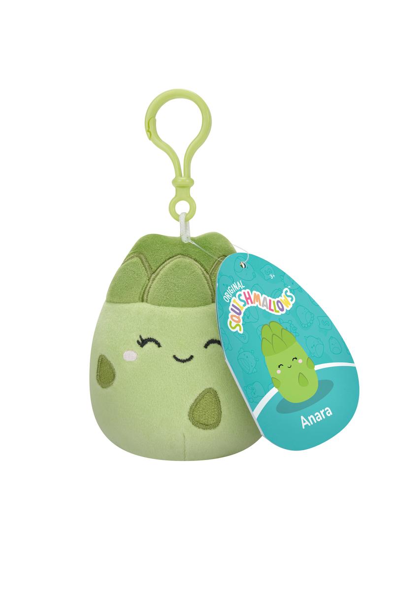 Squishmallow Squishville Veggie Clip plush green asparagus with smiling face and clip-on attachment.