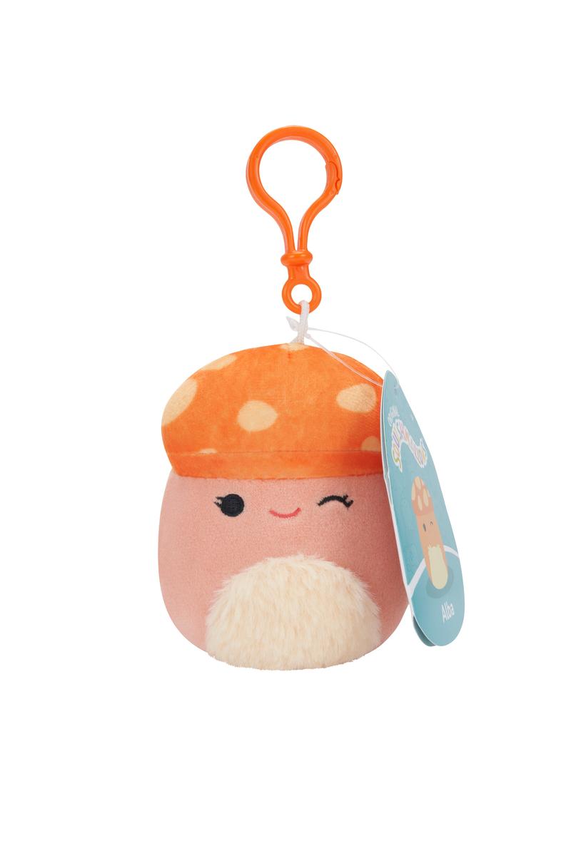 Squishmallow Squishville Veggie Clip featuring a winking orange mushroom plush with a clip-on hook.