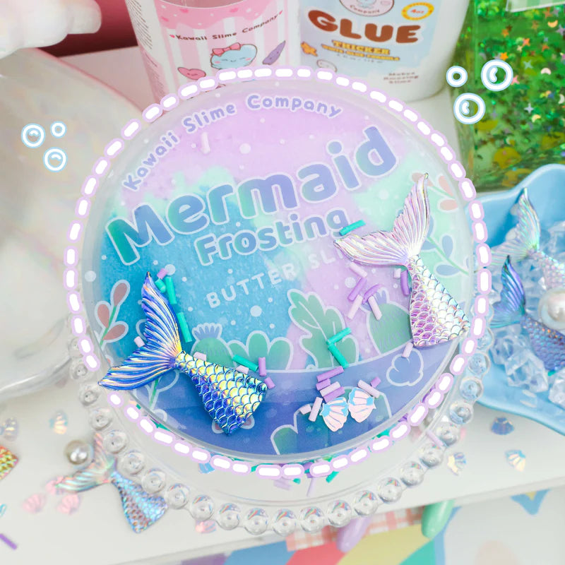 Mermaid Frosting Butter Slime with shimmering mermaid tails and colorful toppings in a pastel container.