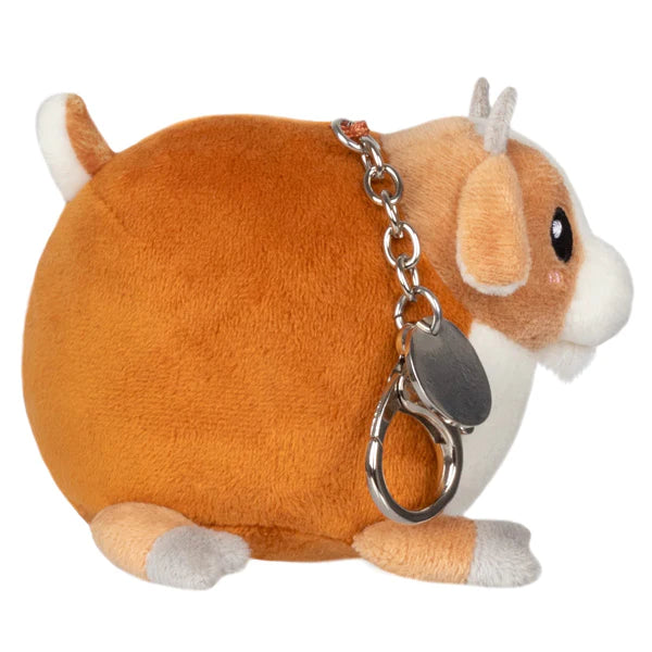 Small round brown and white plush with keychain attached called Baby Goat Micro toy for ages 3 and up