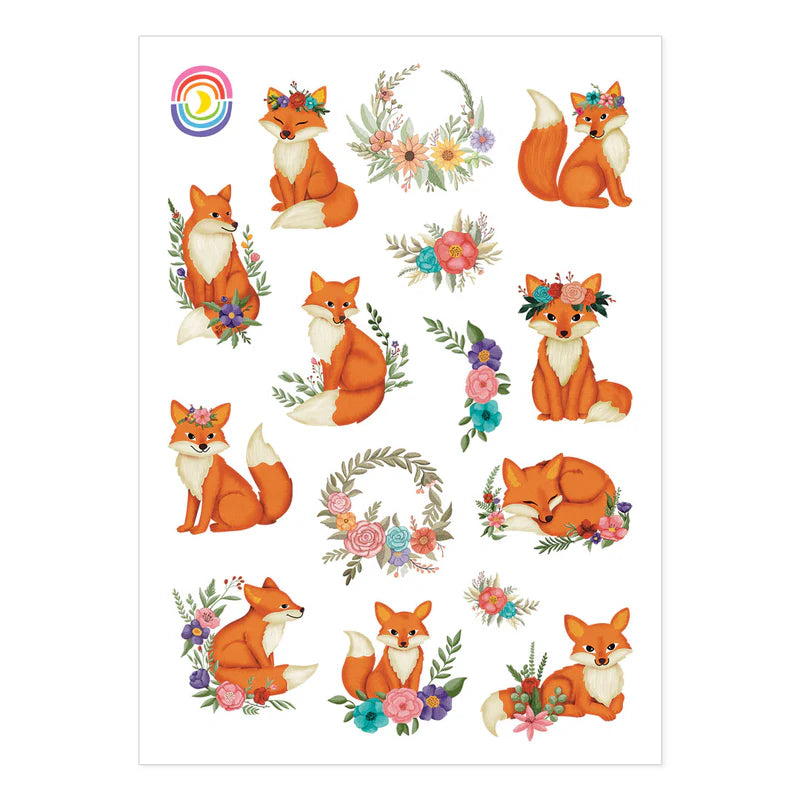 4.25" x 5.8" sheet of 15 hand-drawn stickers of foxes in flower crowns.