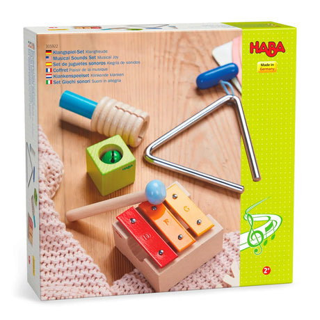 Musical Sounds Musical Joy Play Set with triangle, jingle block, mini metallophone, guiro, and mallet for toddlers.