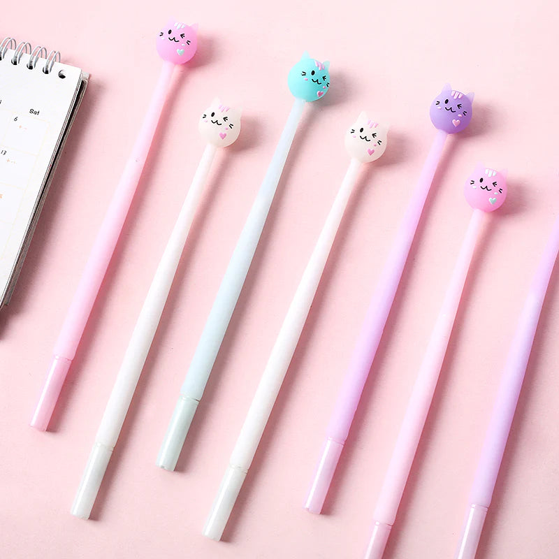 Sweet Cat Wiggle Gel Pen set with fine tip, assorted pastel colors, and cute cat-shaped tops on a pink background.