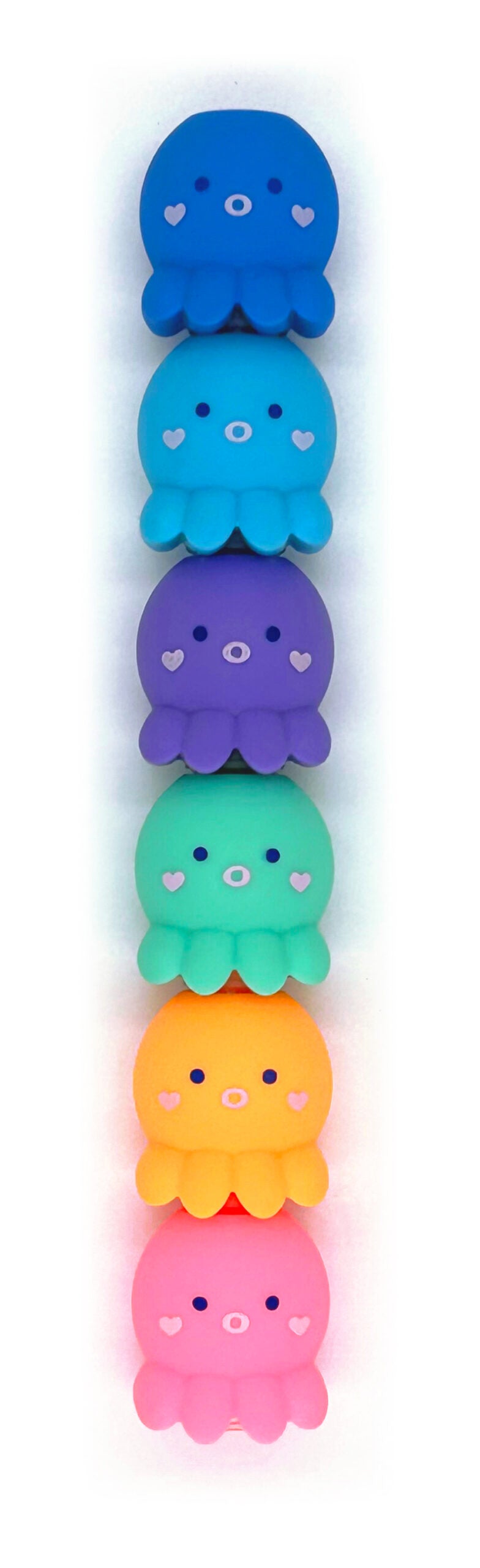 Octo Brites Stackable Markers in bright colors stacked vertically with cute octopus shapes and heart details.