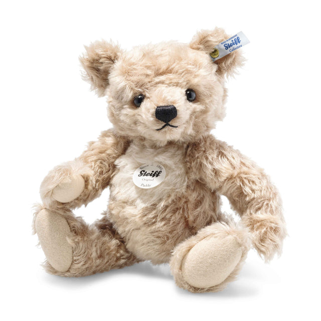 Teddy Bear Paddy plush with light golden-brown mohair fur, white chest piece, and posable limbs, handcrafted and child-safe.